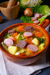 Delicious savoy cabbage stew in a rustic bowl