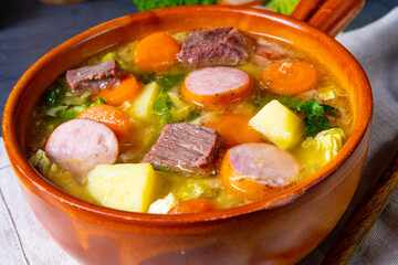 Delicious savoy cabbage stew in a rustic bowl