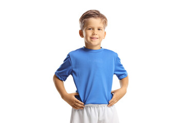 Boy in a sports jersey posing and smiling
