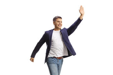 Young man gesturing wait sign with hand