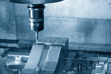 The CNC milling machine cutting press die by solid ball end mill tool.
