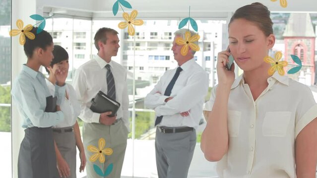 Animation of flowers over diverse business people in office
