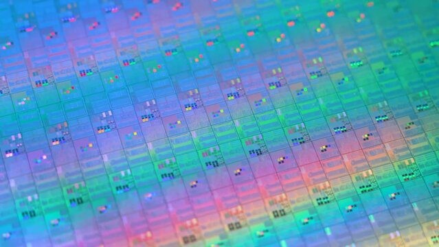 Macro of silicon wafer semiconductor with neon color, integrated circuits to manufacture CPU and GPU