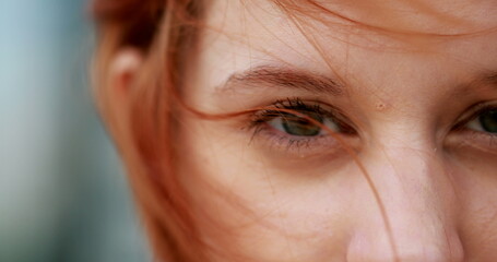 Closeup portrait redhead young woman face looking to camera