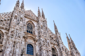Fototapeta premium Exteriors of the Duomo Cathedral in Milan Italy 