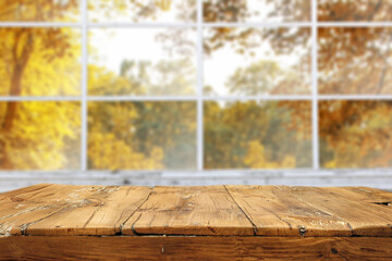 Desk of free space and autumn window. 