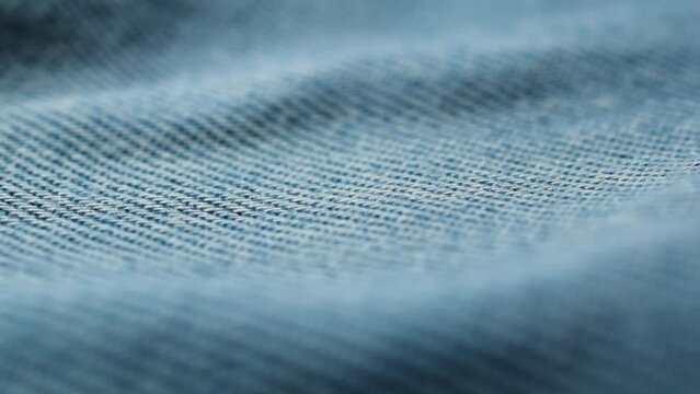 Blue denim texture closeup. Grunge denim background