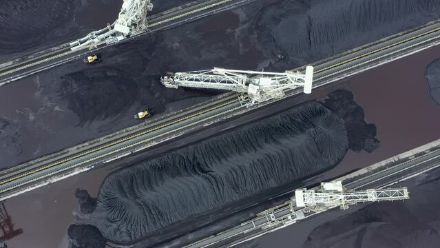 Coal terminal with technics working in it.
