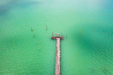 Wooden bridge at Ao Talet or Ta Lhet bay, Nakhon si Thammarat, Thailand