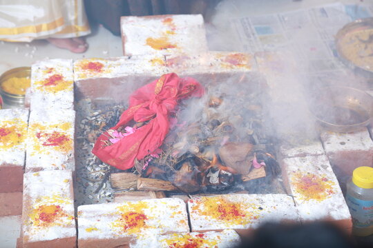 Bangalore, India 8th June 2022: Graha Pravesh. Grah or gruh Pravesh is a Hindu ceremony performed on the occasion of an individual's first time entering their new home. Hindu Hawan pooja Rituals.  