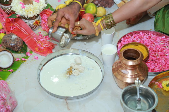 Bangalore, India 8th June 2022: Graha Pravesh. Grah or gruh Pravesh is a Hindu ceremony performed on the occasion of an individual's first time entering their new home. Hindu Hawan pooja Rituals.  
