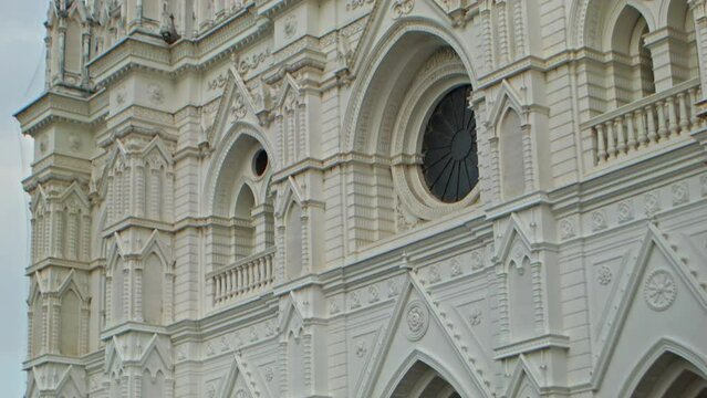 Tilt up shot of detail of the facade of The Cathedral of Our Lady Saint Anne located in Santa Ana, El Salvador