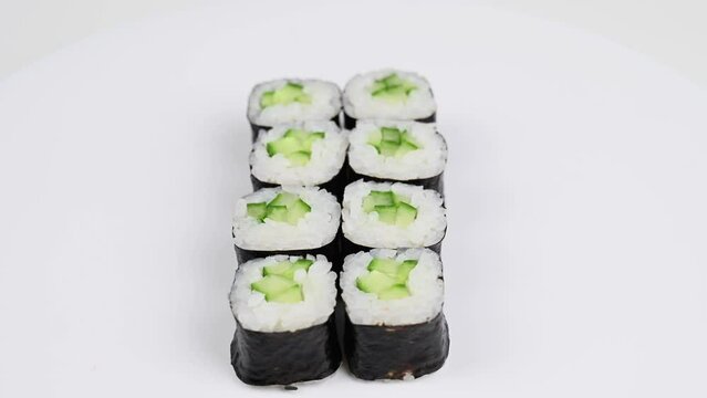 Set of kappa maki rolls spin on white background. 