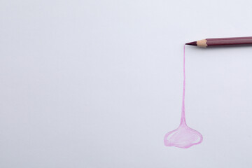 Abstract drawing and color pencil on white background, top view