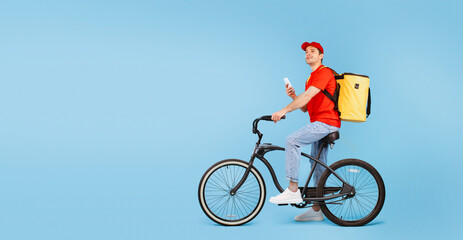 Courier Guy On Bike Using Smartphone Delivering Meal, Blue Background