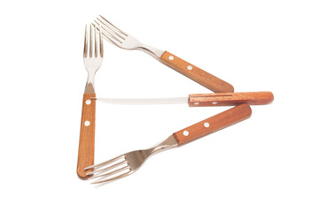 3 forks and 1 knife with wooden handles making the letter B on a white background