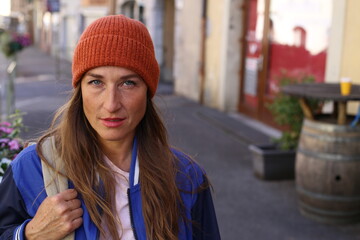 Upset looking woman walking outdoors 