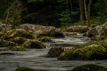 Fototapeta premium Vltava river near Vyssi Brod town with flood water in dark cloudy day