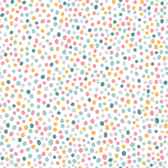 Cute hand drawn seamless pattern with Colorful Polka Dots. Abstract Multicolored doodle stain on white background. design for background, wallpaper, wrapping, fabric, and all your creative project.