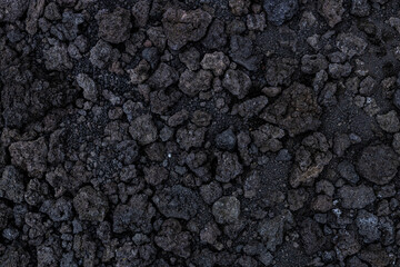 Background texture from volcanic lava stones. Volcanic rock from Etna, Sicily, Italy