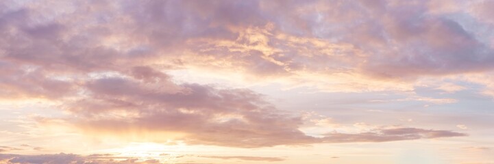 Naklejka na ściany i meble Awe pastel colored romantic sky at sunset