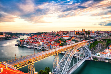 Porto Aerial Cityscape with Illuminated Luis I Bridge and Douro River at Amazing Sunrise