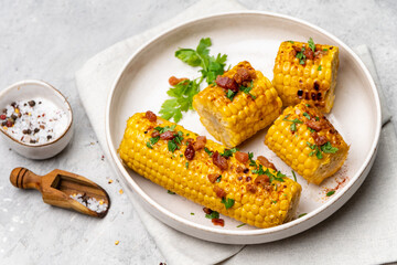 Grilled sweet corn with paprika salt and parsley