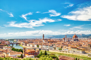 Fototapeta premium Florence Aerial View of Ponte Vecchio Bridge during Beautiful Sunny Day, Palazzo Vecchio and Cathedral of Santa Maria del Fiore with Duomo during Beautiful Sunny Day