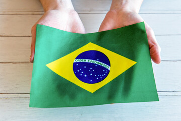Hands holding the Brazilian Flag, September 7, Brazil's Independence Day