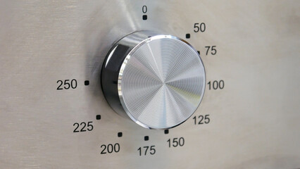 Close-up of oven temperature controller