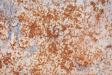 Red rust on a metal surface, background.