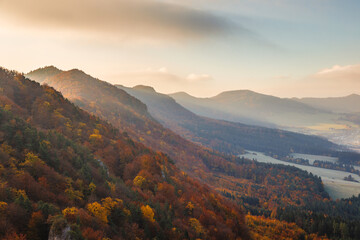 Ridges of hills in autumn colors. National Nature Reserve Sulov Rocks, Slovakia, Europe.