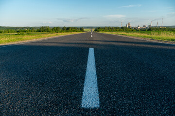 New modern asphalt in rural areas. High-quality conditions for business development in the field of cargo transportation and logistics.