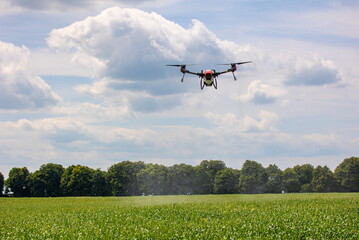 A modern solution in agricultural. Use of robotic systems with agriculture spraying drone fly to...