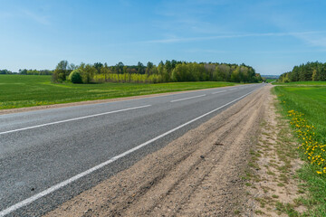 New modern asphalt in rural areas. High-quality conditions for business development in the field of cargo transportation and logistics.