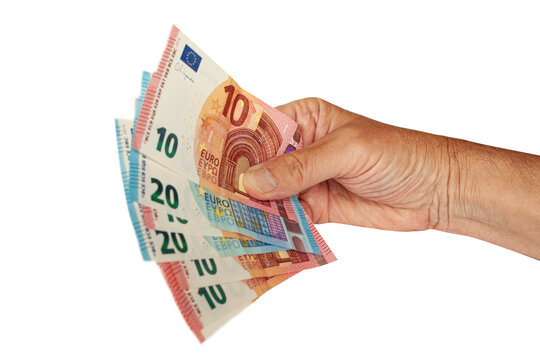 Hand holding range of Euro banknotes. Image isolated on white background. Expenses and incomes in European countries. Euro currency exchange rate. Cost of goods in EU.