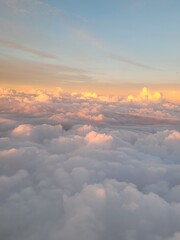 Clouds over the sky. Sunset in a plane. Calm and serenity. background