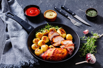 grilled chicken breasts with browned new potatoes