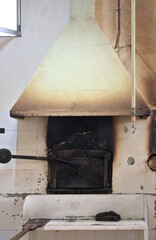 Traditional oven inside a bakery with its metal chimney