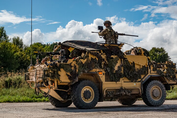 army recon vehicle in action on an exercise © Martin