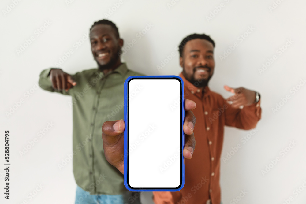 Poster two black guys showing huge cellphone empty screen, white background