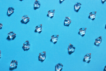 Ice cubes on blue