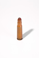 One blank cartridge on white