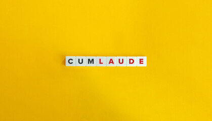 Cum Laude (With Honour) Latin Phrase on Block Letter Tiles on Yellow Background. Minimal Aesthetics.