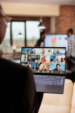 Woman Attending Business Meeting Videocall With Colleagues, Talking On Online Videoconference Call With Webcam. Using Laptop To Talk On Remote Teleconference Chat, Telecommunications.