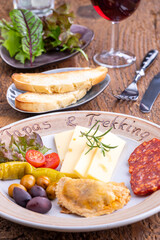 empanadas and spanish tapas on a plate