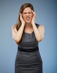 Woman with headache touching head isolated portrait with eyes closed.