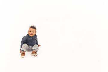 cute Afro-American little boy with a fake mustache, medium closeup studio shot isolated. High quality 4k footage