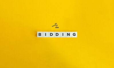 Bidding Word and Concept. Letter Tiles on Yellow Background. Minimal Aesthetics.
