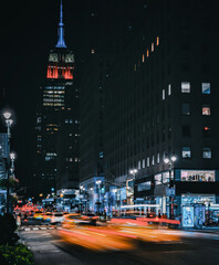 Fototapeta na wymiar traffic at night in New York Manhattan fast taxi cars colors 
